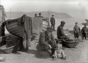 Men with line baskets on the beach at cromarty