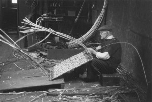 Man making a mill skip for the wool industry, Kissling archive, School of Scottish Studies
